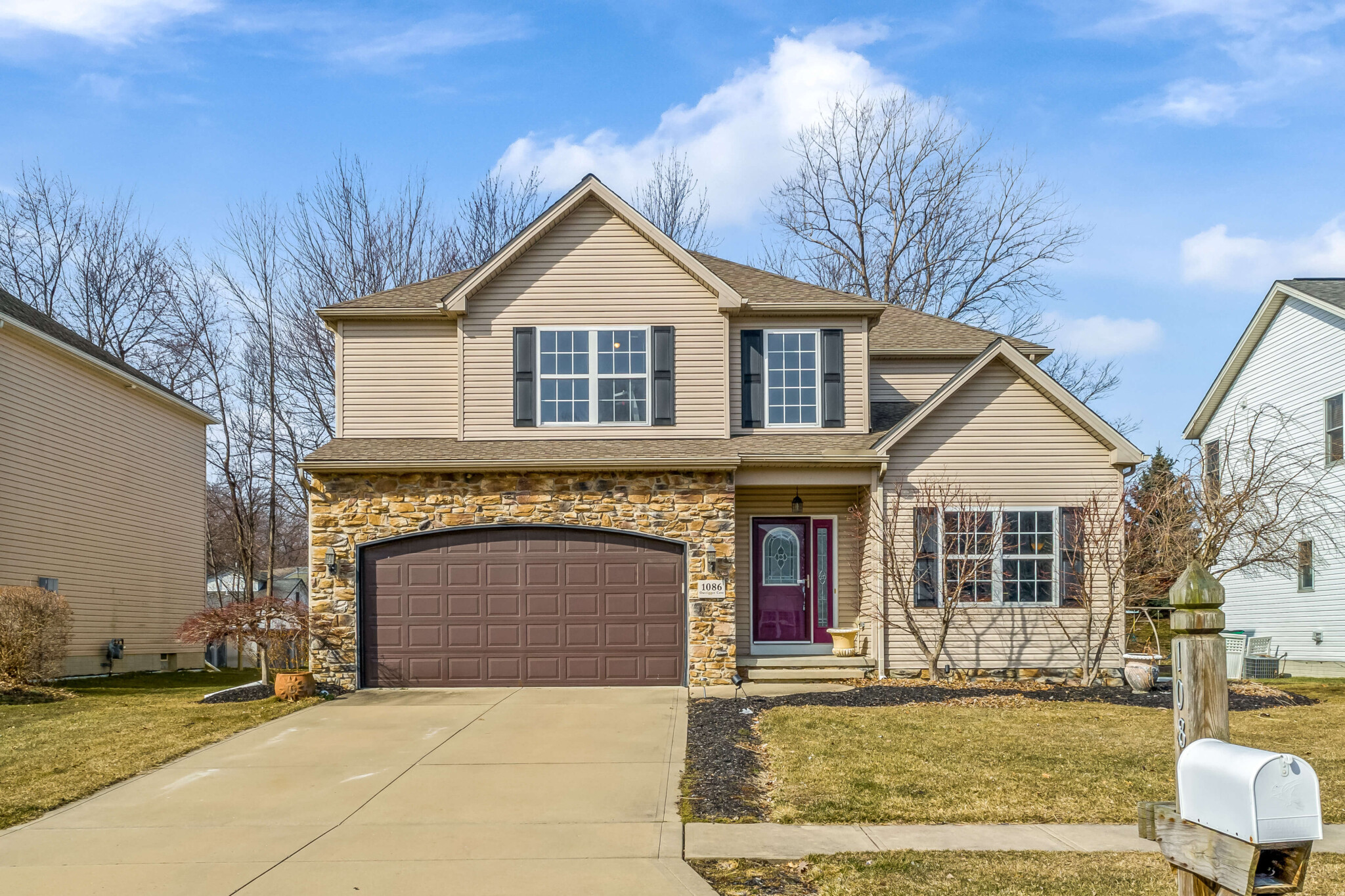 Colonial Home in Lake Erie Shores Exactly Real Estate Flat
